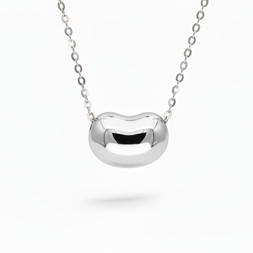 Silver necklace with a unique pendant on