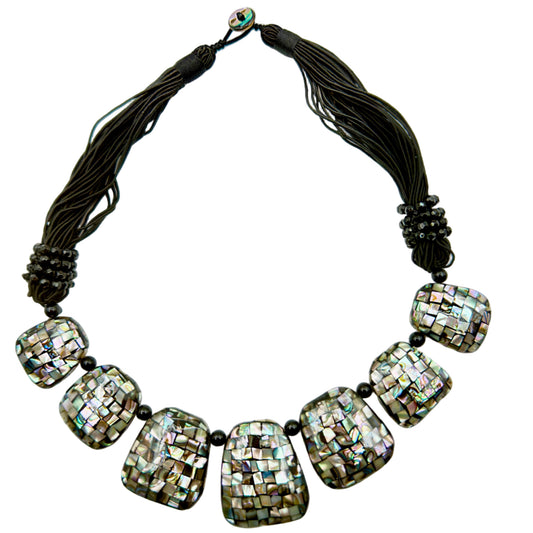 Large abalone shell pendant necklace on a 50cm matinee chain, showing the iridescent colors.