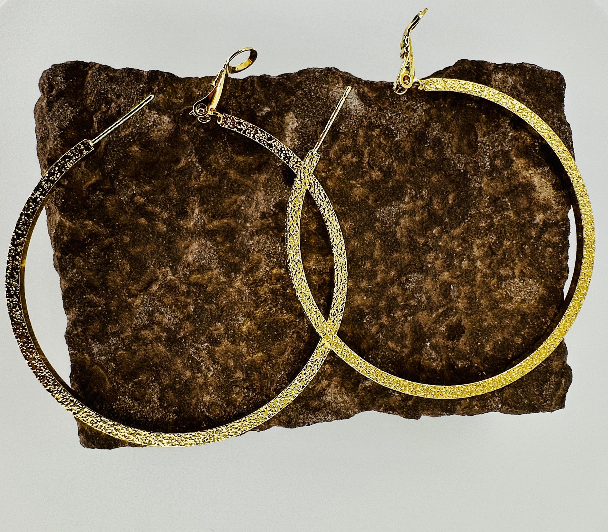 Close-up of hammered gold surface