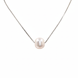Pearl necklace on a white background
