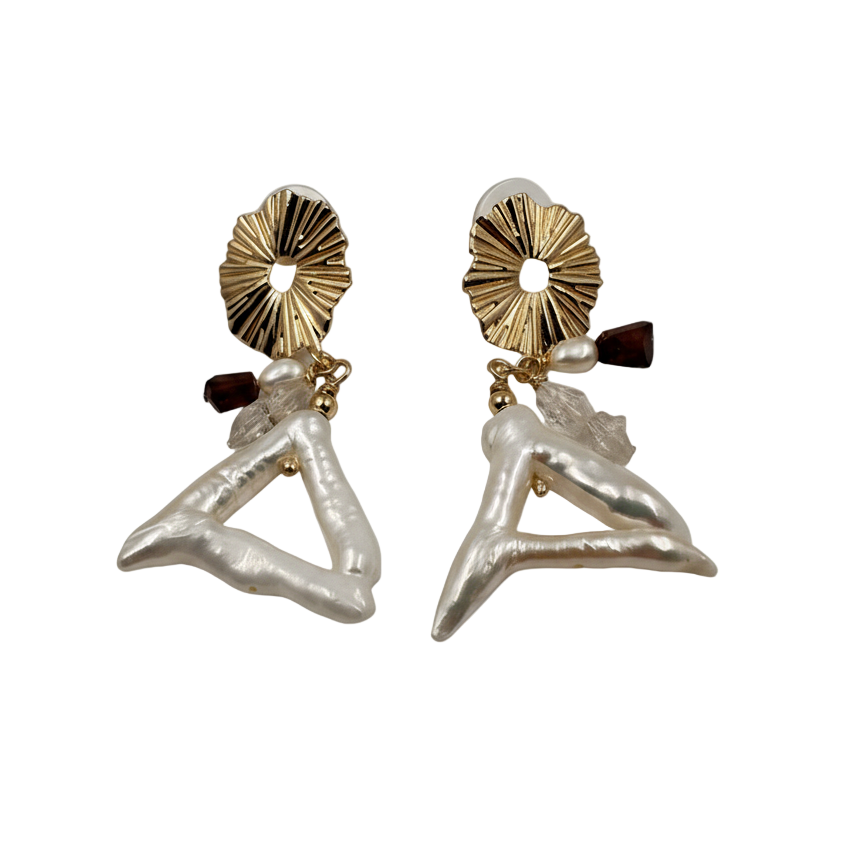 Elegant triangular shaped freshwater cultured pearls in modern jewelry design showcasing baroque pearl beauty