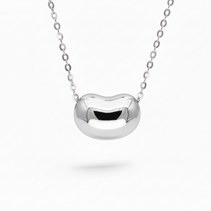 Silver necklace with a unique pendant on 