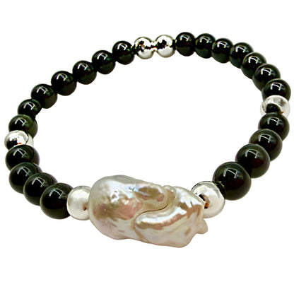 Image showing the full length of the obsidian and pearl beaded bracelet.