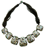 Large abalone shell pendant necklace on a 50cm matinee chain, showing the iridescent colors.