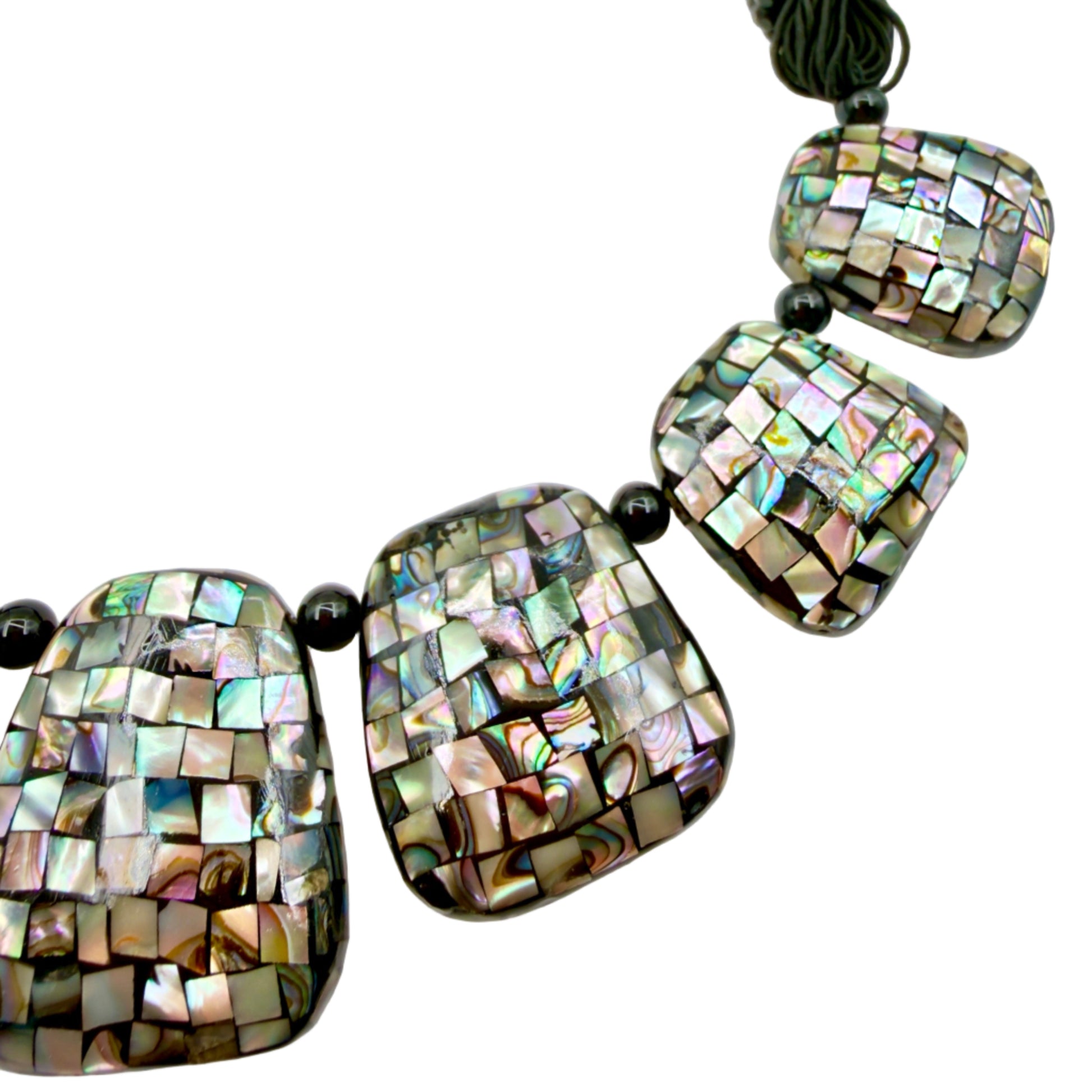 Close-up of abalone shell mosaic details
