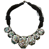 Large abalone shell pendant necklace on a 50cm matinee chain, showing the iridescent colors.