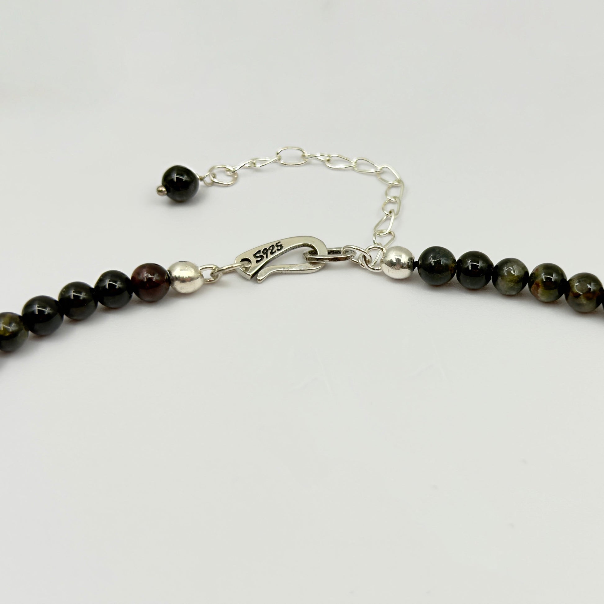 Detail of S925 sterling silver lobster clasp and extension chain
