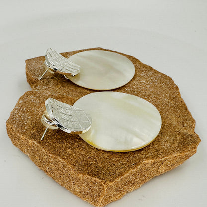 Side view showing depth and layering of shell and alloy discs