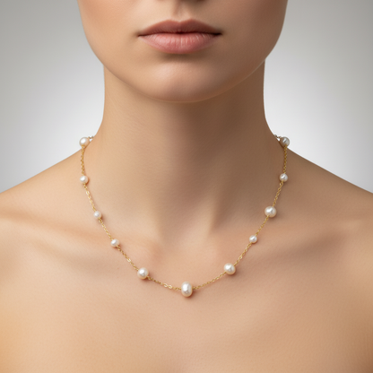 Pearl necklace on a mannequin with a neutral background