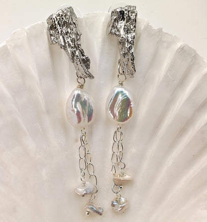 Platinum-plated dangle earrings with 16mm x 11.5mm baroque pearl and two 6.5mm pearls on 925 chain
