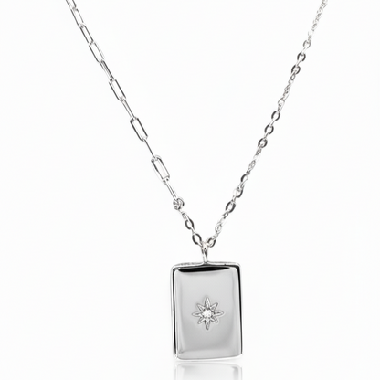 Close-up of rectangular pendant and zirconia star