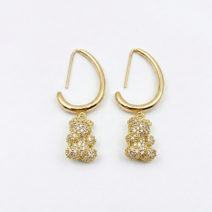 14k gold-plated bear charm earrings with zirconia inlays on white background